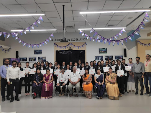 The engineering team in India. Female engineers holding their certificates.