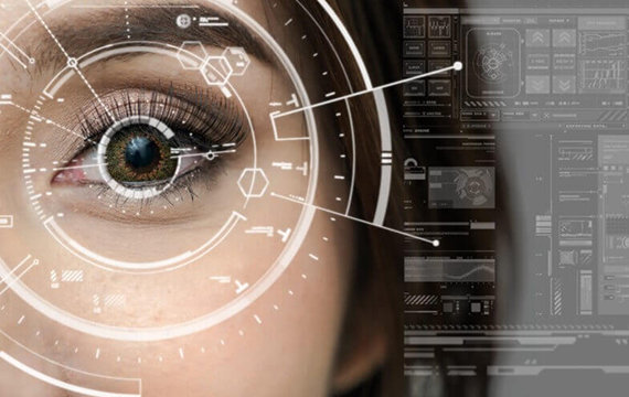 A close-up of a human eye with digital interface graphics overlaid, representing biometric scanning or futuristic technology.
