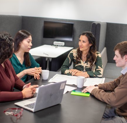 People discussing on table