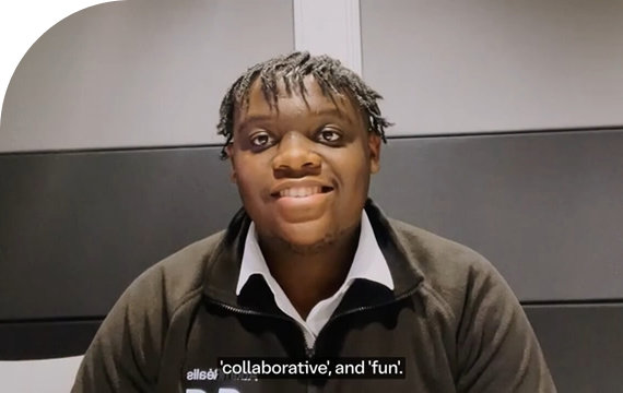 Smiling man in a room.