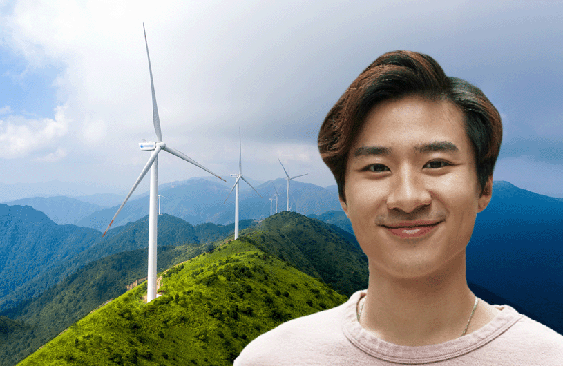 windmills and a man smiling