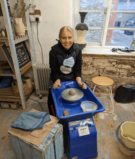 Emily doing pottery