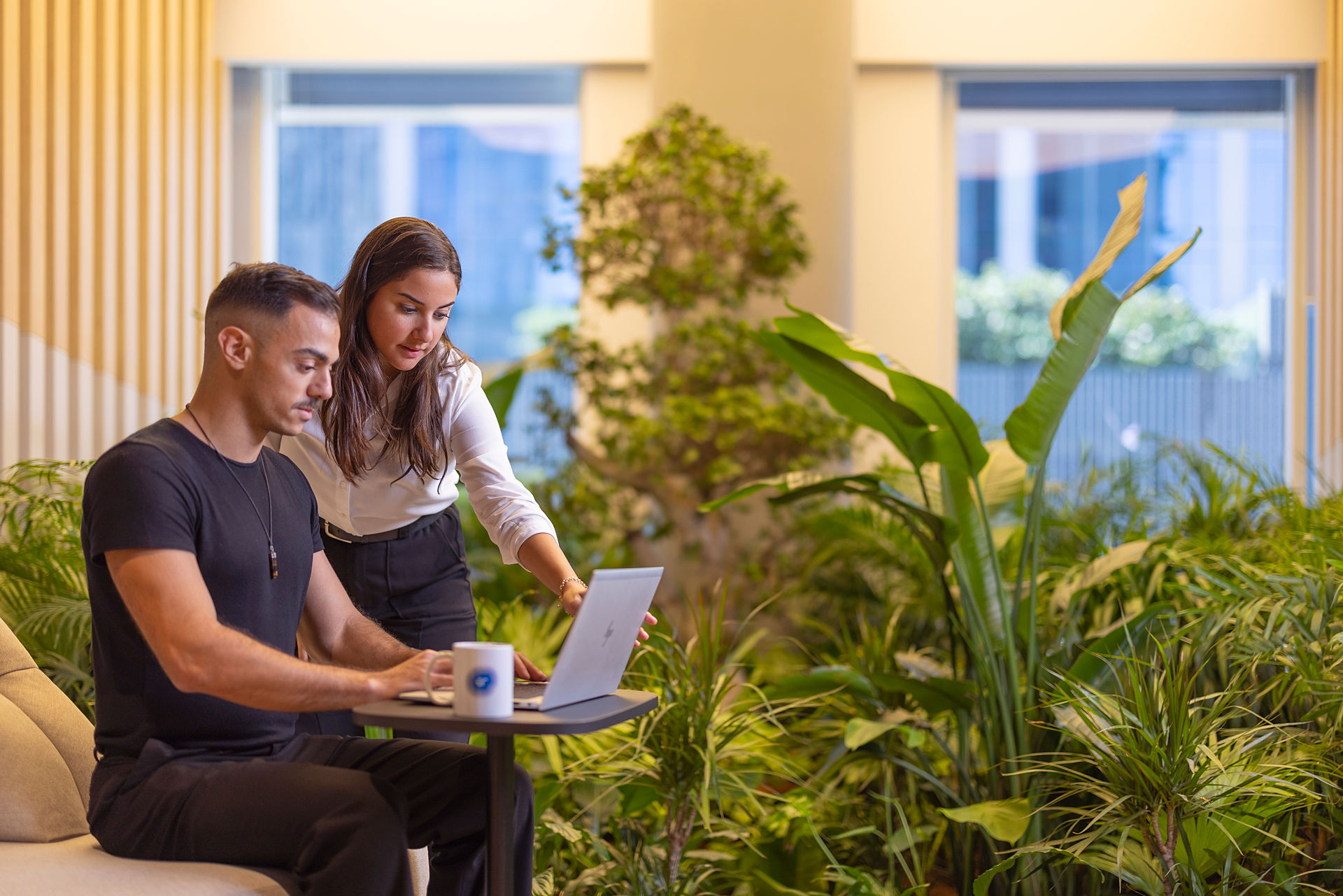 Man and woman with laptop