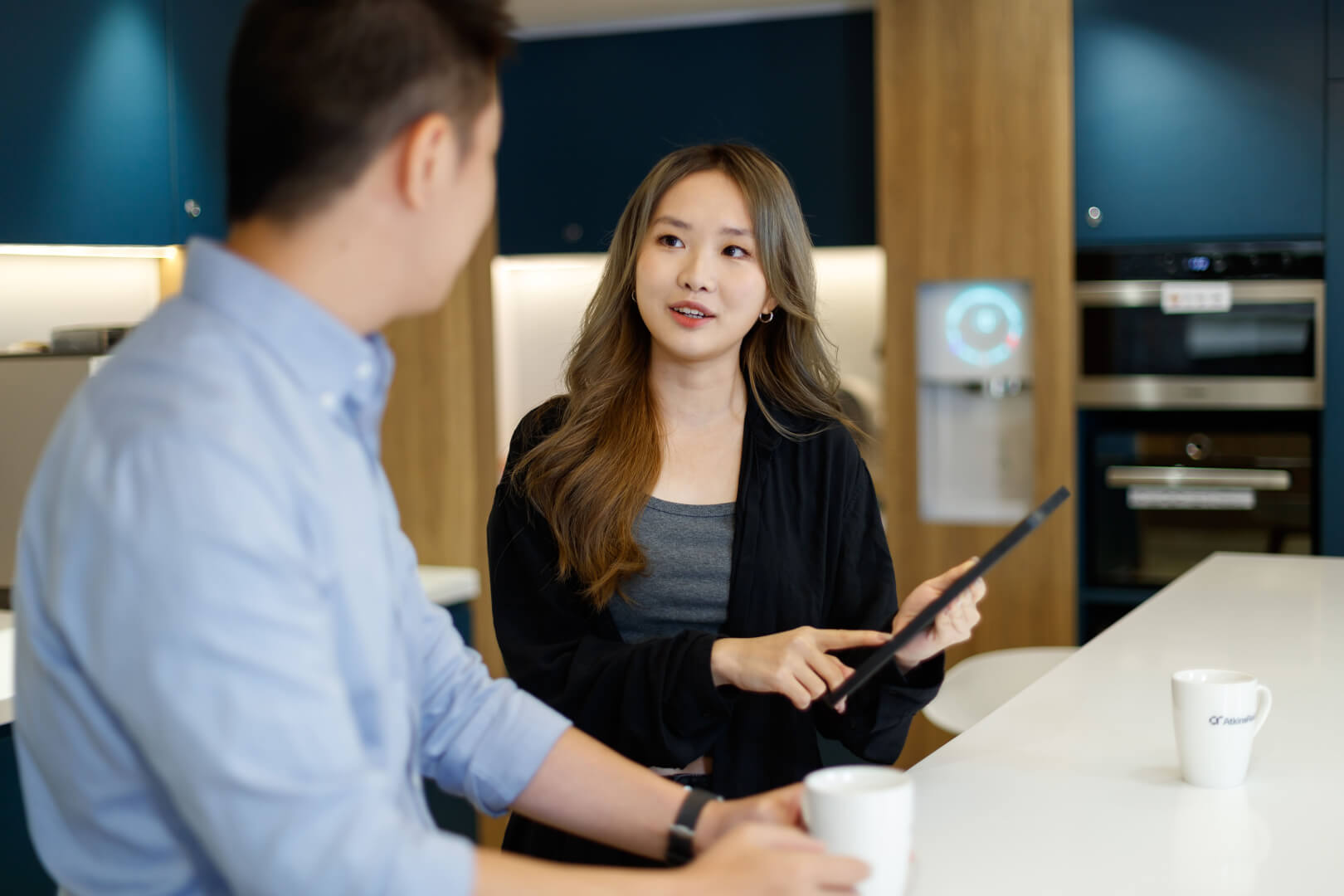 Team members in Asia collaborating in the workplace