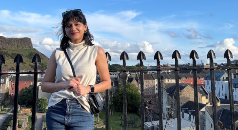 Picture of Devashree smiling at the camera