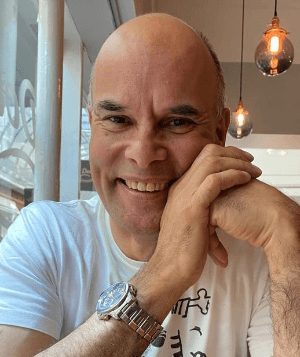 Photo of Jim smiling towards the camera