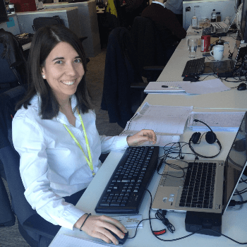 Photo of Clara at her workstation