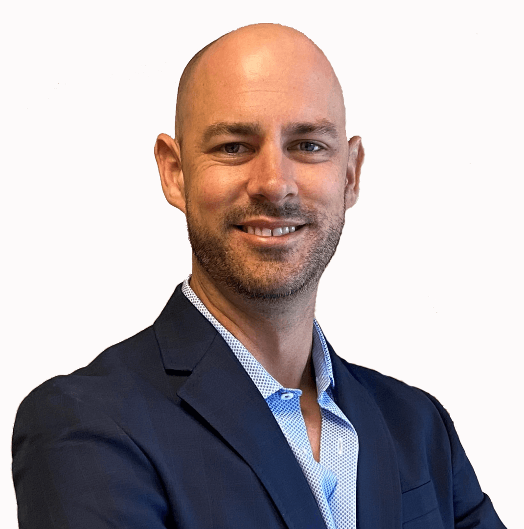 Professional portrait of a man smiling in business attire