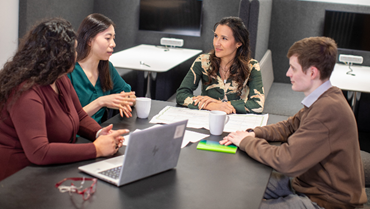 Group of people talking to each other