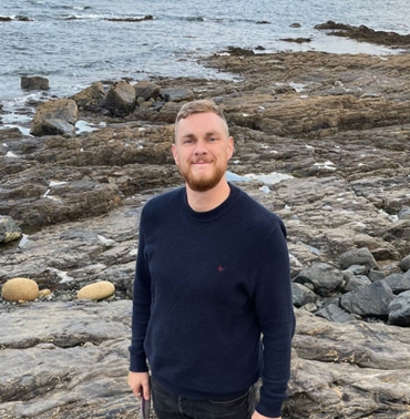 Photo of david near a beach.