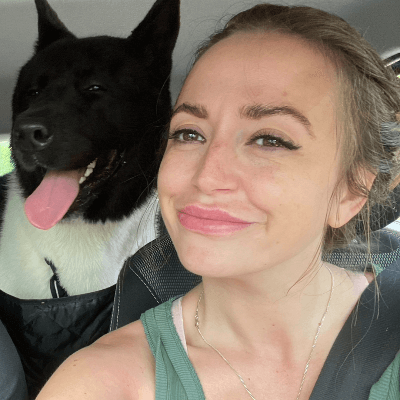 Colleen smiling towards the camera