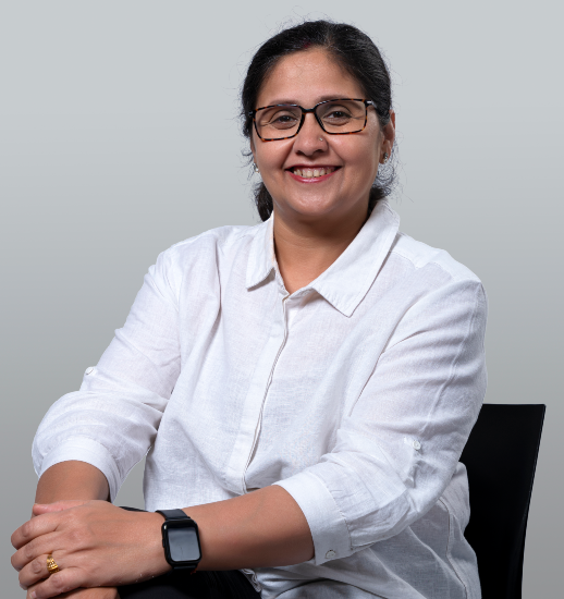 Photo of Manisha smiling towards the camera