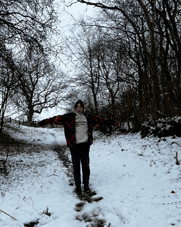 Courtney standing in the snow