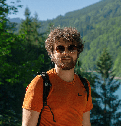 Photo of Harry smiling towards the camera