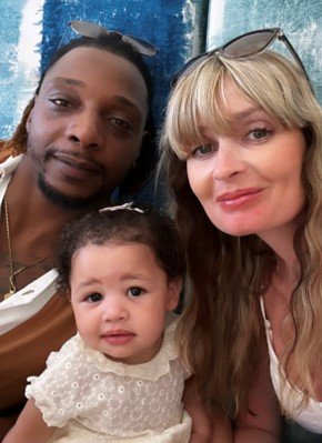 Photo of Dou wih his family