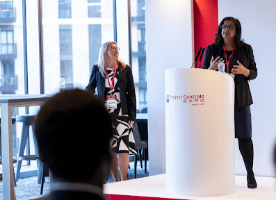 Photo of Kiran smiling towards the camera