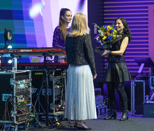 A picture of Amalia receiving her award