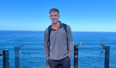 a man standing on a beach.