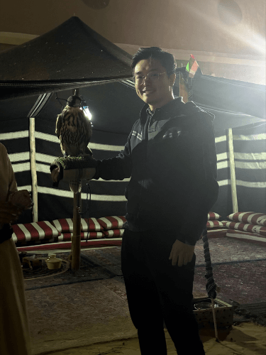 Gordon holding a trained falcon 