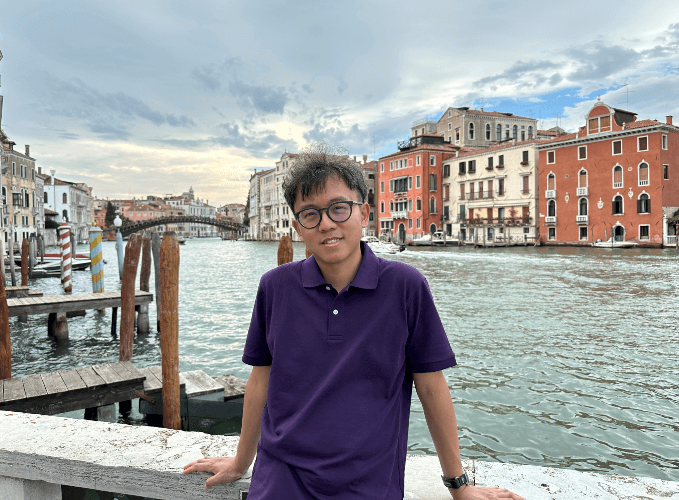 A smiling picture of Will in Venice