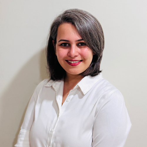 Image of Angela smiling at the camera