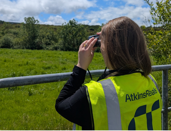 Image of Caroline assessing on field