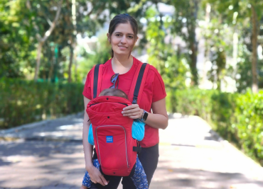 Hrudya carrying her child