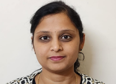 headshot of Akhilamba smiling