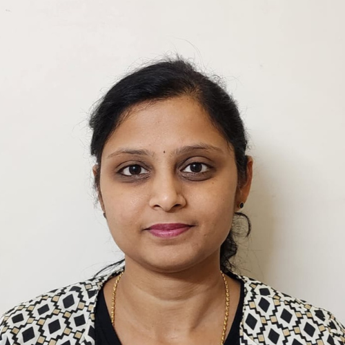 headshot of Akhilamba smiling a bit