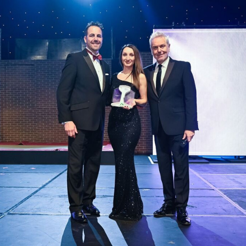 A picture of Alina and her colleagues at an award function