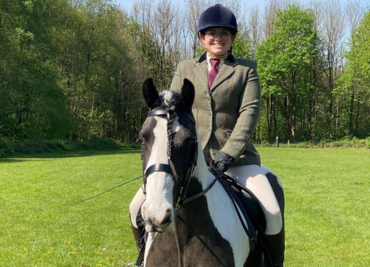 Image of Anna on a horse