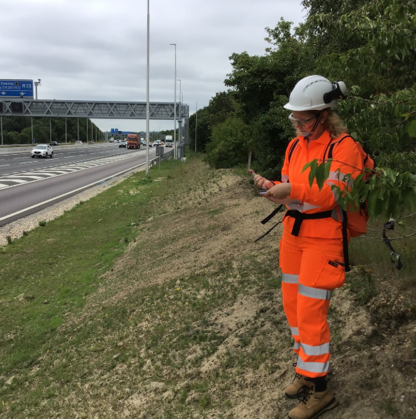 Picture of Maria standing near a road