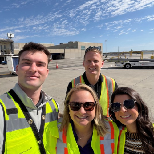Group pic of Serafina and her colleagues in hi-vis suits