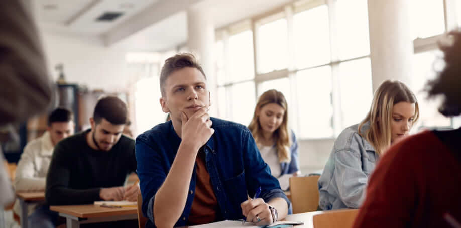 A group of people giving exam