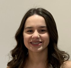 Photo of Elizabeth smiling towards the camera