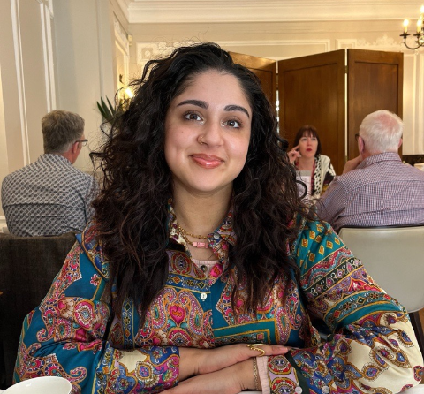 Photo of Hanna smiling towards the camera