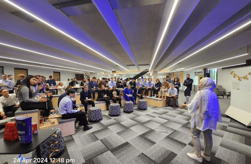 A picture of Omaya during a presentation