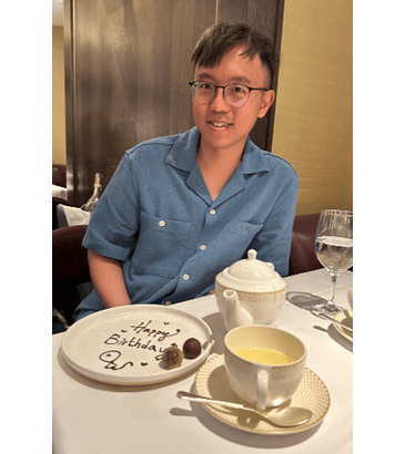 A picture of Will celebrating his birthday at a restaurant