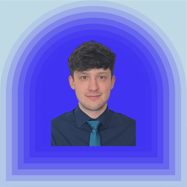 A passport size photo of Tom